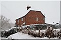 New Cottage in a snow storm