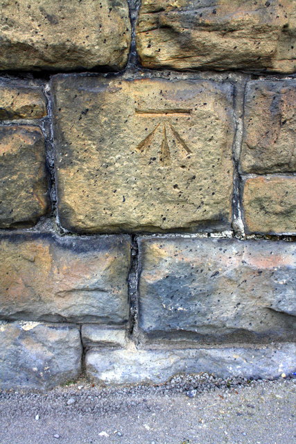 Benchmark on wall of Richardshaw Lane opposite Varley Street