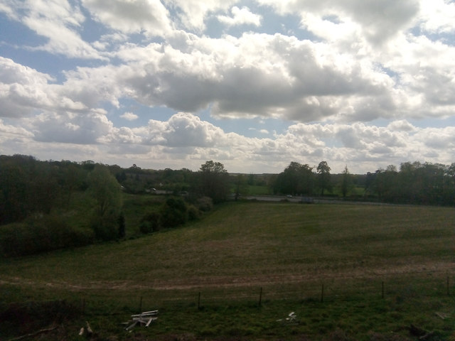 The A12 dipping into the River Ter valley, from the railway