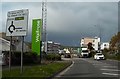 Waitrose sign, with the Fire Station behind