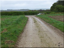 TF2582 : Bridleway track exiting onto Manor Hill by Peter Wood
