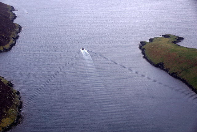 Salmon boat in Hoy Sound, outer Weisdale Voe, from the air