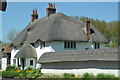 Thatched house and wall at Monxton