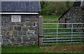 Outbuilding with "Caebach Chapel Stable" sign