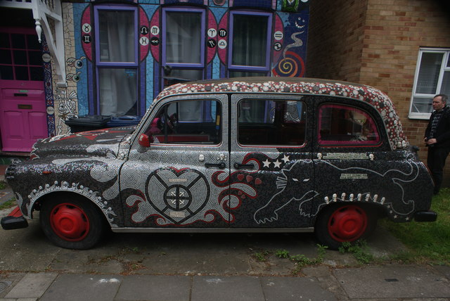 View of the "Voodoo Zulu Liberation Taxi" in front of The Treatment Rooms on Fairlawn Grove