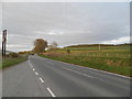 NH5845 : The A862 at Inchberry Farm by Douglas Nelson