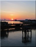 SU4110 : Sun setting behind Royal Pier, Southampton by Paul Coueslant