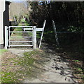 Inwardly-sloping barrier and a gate across a path towards Cwm Capel, Carmarthenshire