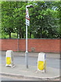 Traffic island and milepost in Chester Road, Wrexham