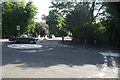 View of a Mercedes Benz 230SL  crossing the roundabout at the junction of Court Road, Tilt Yard Approach and North Park