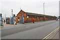 Building beside Meadow Lane NE of gateway to former meat market