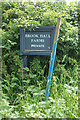 TM3875 : Brook Hall Farms sign by Geographer