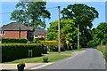 Houses and flowerpots on Fletchwood Lane