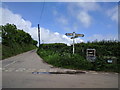 Signpost and eggs for sale at Hittisleigh Cross