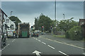 Behind the bin lorry