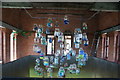 View of an unusual collection of artistic jars suspended from the ceiling in the Engine House of the Walthamstow Wetlands #3