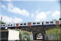 View of a London Overground Class 315 crossing the Essex Road bridge