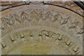 Elkstone, St. John the Evangelist Church: The magnificent south doorway tympanum