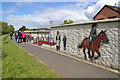 Artwork on a Selkirk flood protection scheme wall