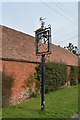 An old village sign