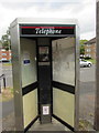 Empty former BT phonebox in suburban Cheltenham 