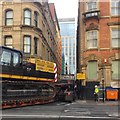 Low loader squeezing into the north end of Back George Street, Manchester