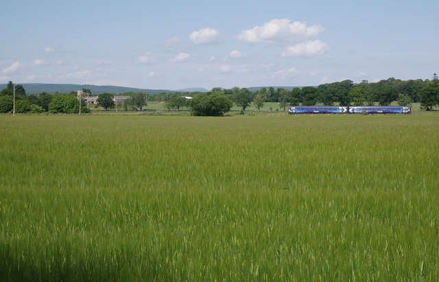 Train from Tain, passing fields by Fearn