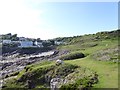 Limeslade Court and rocks in Limeslade Bay