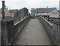 Across a river footbridge, Bridgend