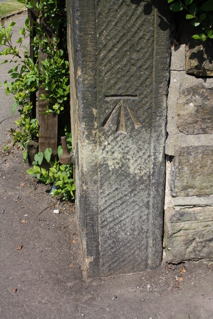 Benchmark on post at Rochdale Road wall angle
