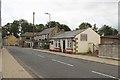 NU1301 : Front Street, Longframlington by Graham Robson
