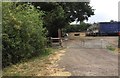 Footpath past old lorries