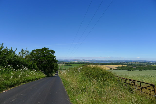 Road from Ochiltree Castle dropping down to Haugh Burn