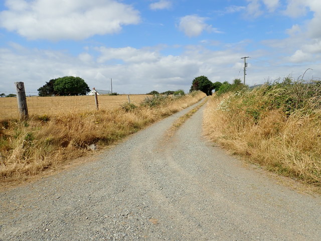 Farmhouse and field access lane leading due west from the coastal road