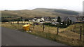 Yellow grit box and a view across Fochriw