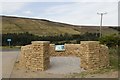 SE0676 : Dry stone wall enclosure with visitor information by Mark Anderson
