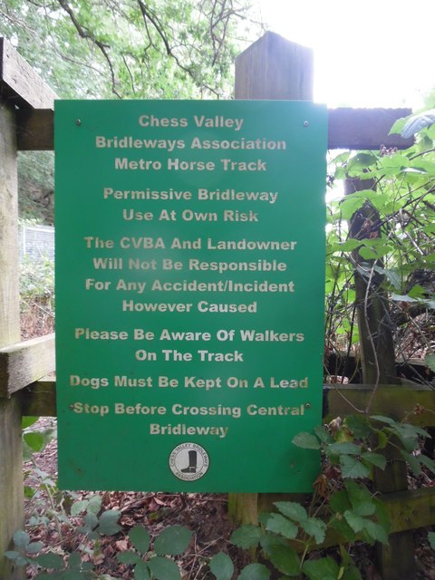 Green Notice Board by railway bridge