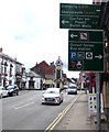 Green directions signs alongside the A44 East Street, Rhayader