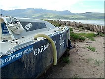 Q5612 : Abandoned wreck of the Illumia 12 yacht, on Fermoyle Strand. by Peter Evans