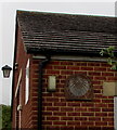 Sundial on a wall of Oakridge Village Hall, Oakridge Lynch, Gloucestershire