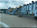 Police on guard outside the fire-gutted Ty Belgrave House, Aberystwyth