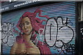 View of a mural on the shutter of Venus Nails and Beauty on Brockley Road