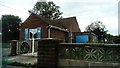 House with blue shutters and garage doors, Leigh