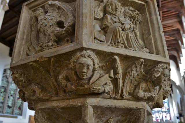 Stoke by Nayland, St. Mary's Church: The c15th octagonal font with carvings of cherubs