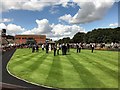 TL6161 : Clouds and crowds at The July Course, Newmarket by Richard Humphrey