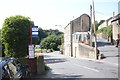 Bus-stop and narrow building