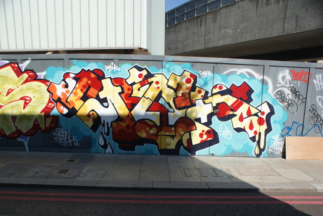 View of street art on hoarding on Holywell Street #3