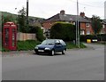 Dorchester Road red phonebox, Maiden Newton