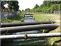 Pipes across the Staines Reservoirs Aqueduct by Moor Lane