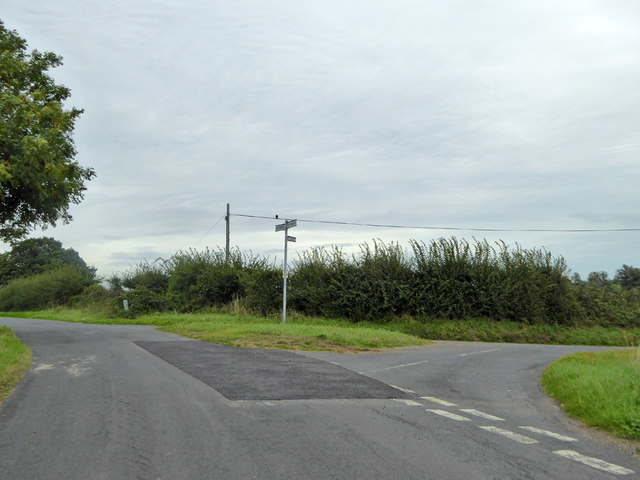 Grass triangle at road junction